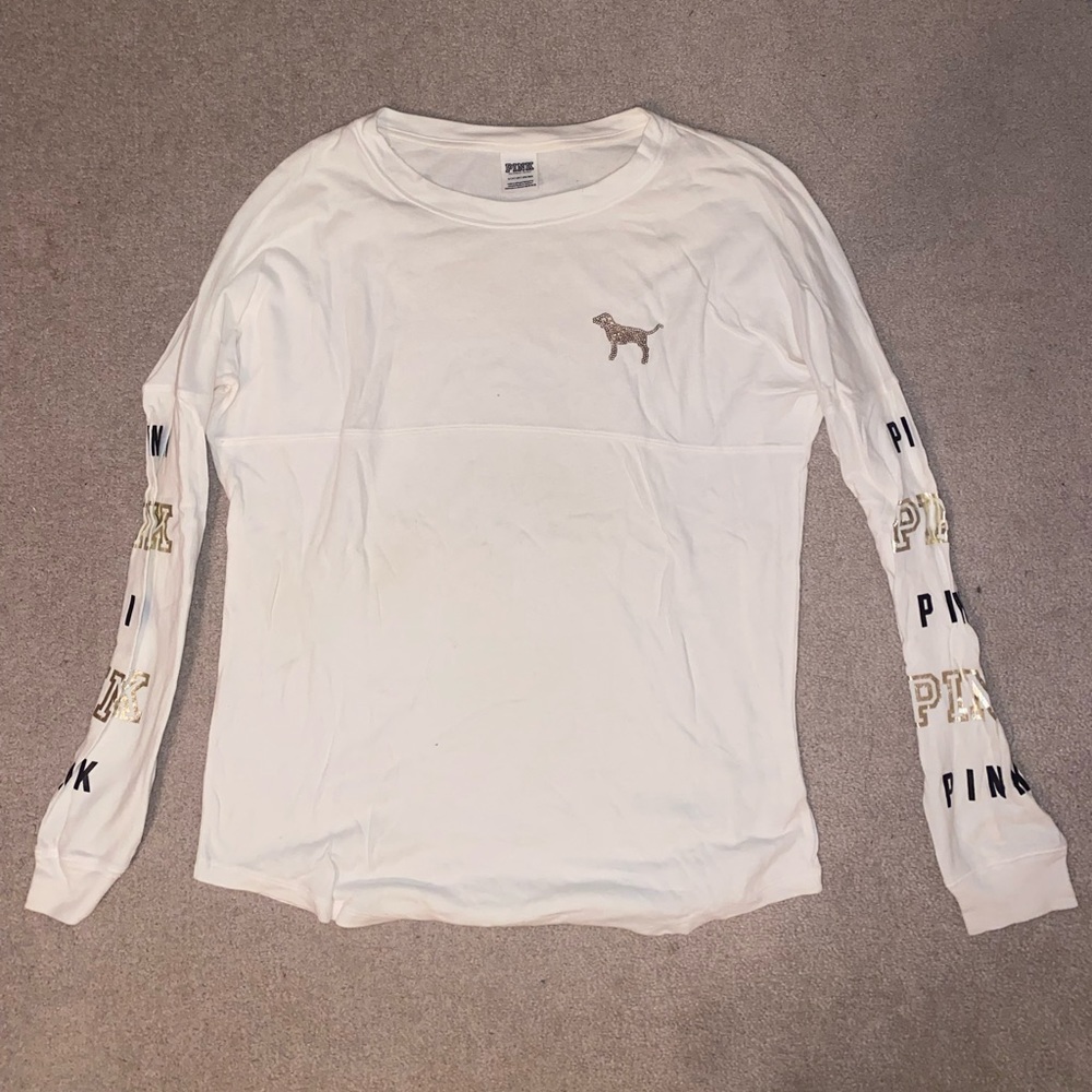 White long sleeve shirt from PINK with gold detail.